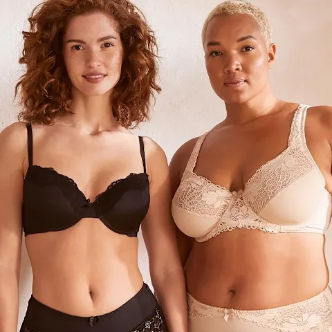 Elegante Unterwäsche in Schwarz und Creme: Spitzen-BHs mit feinen Details für verschiedene Figurtypen.