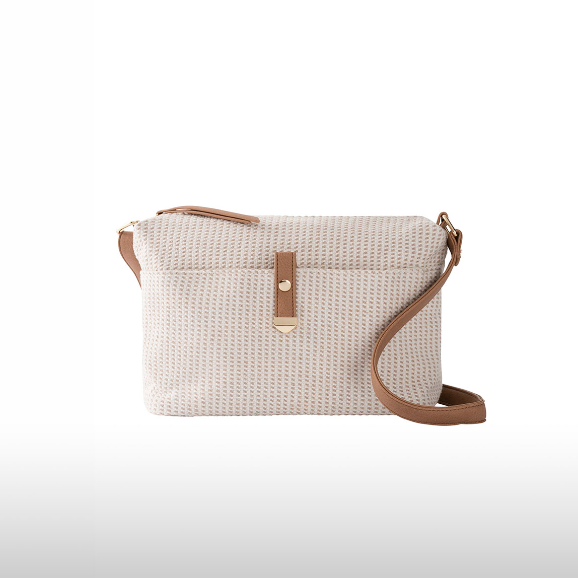 Beige Handtasche mit braunen Lederdetails und verstellbarem Schulterriemen.