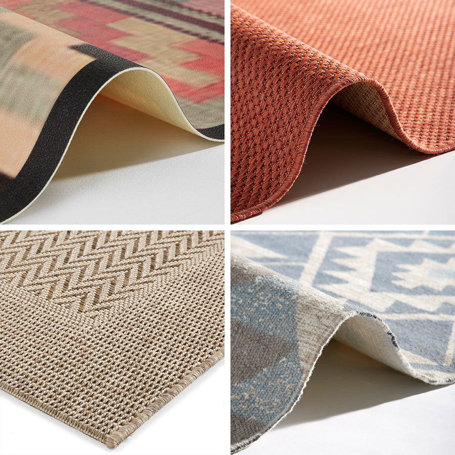 Verschiedene Teppiche und Textilien mit unterschiedlichen Mustern, Farben und Texturen sind zu sehen.