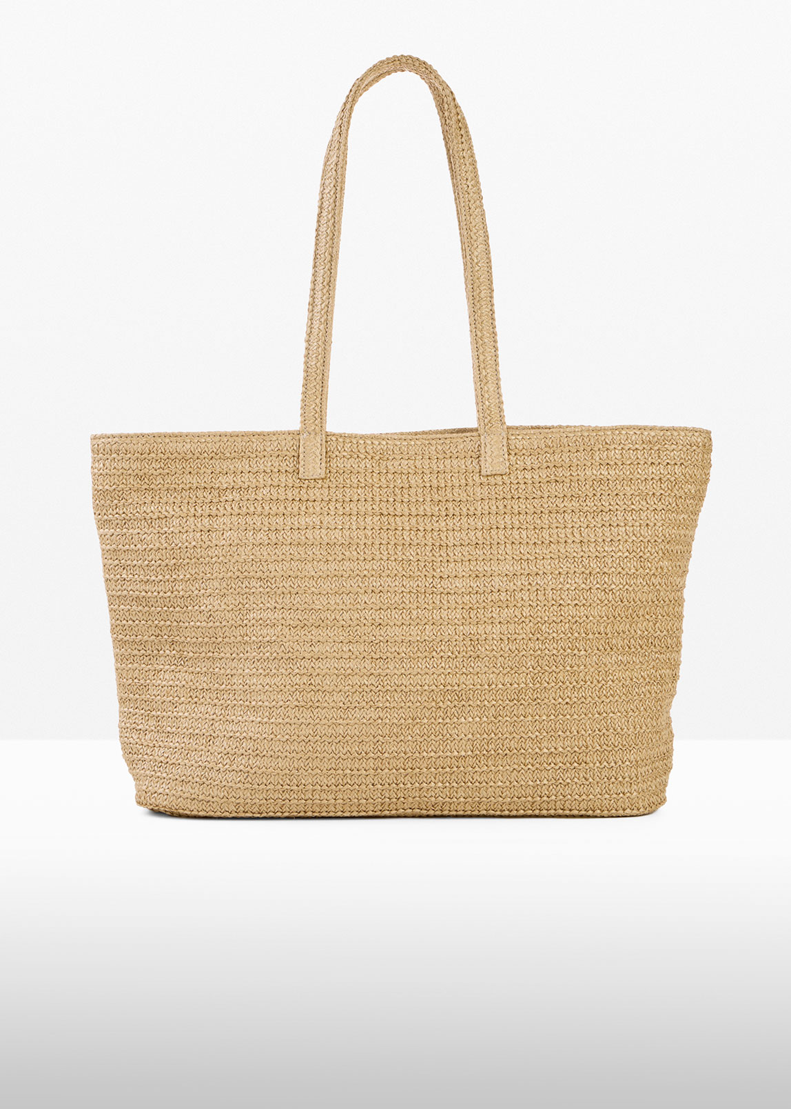 Diese beige, geflochtene Strandtasche ist perfekt für sommerliche Outfits und den Strand.