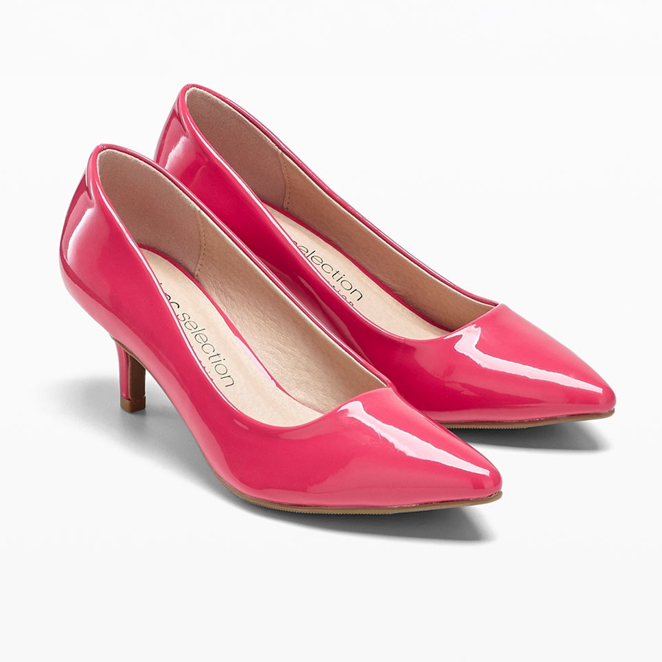 Elegante pinkfarbene Lackleder-Pumps.